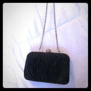 Black pleated clutch